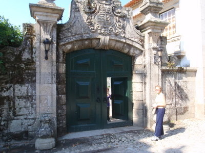 Cecilia is inside the gate, greeting Terry.